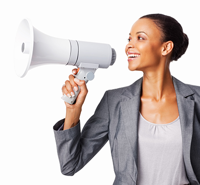 A profile shot of a professionally dressed woman holding a megaphone.